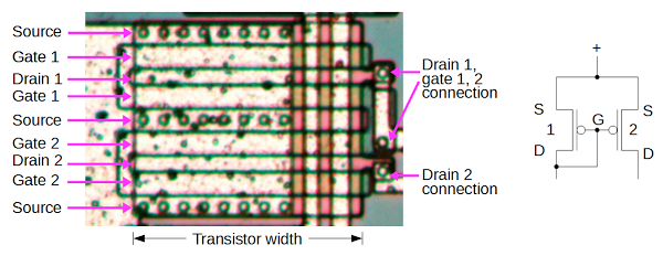 Two pairs of PMOS transistors in the LMC555 chip form a current mirror.