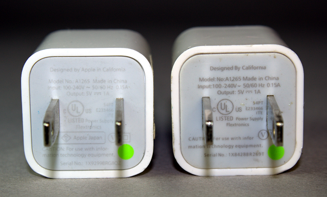 A real Apple iPhone charger (left) and a counterfeit charger (right