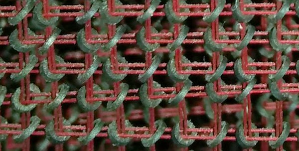 Closeup of the core memory in the IBM 1401 mainframe, showing the tiny ferrite cores.