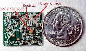 Apple iPhone charger circuit board compared to a mustard seed, grain of rice, and quarter.