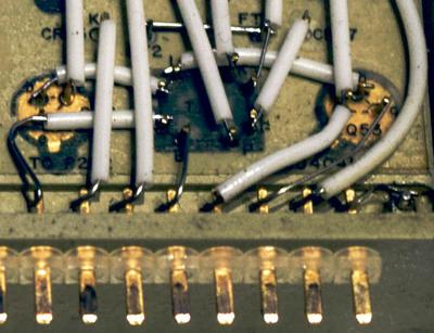 Closeup of one switch circuit in the Current Switch Module. The switching core (center) has transistors on either side.