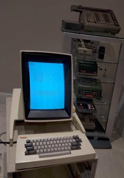 The Alto running the keyboard test program. Antique calculators are in the background.