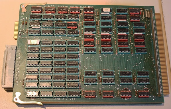 The Xerox Alto's CRAM board (Control RAM) stores 1024 microcode instructions. The 32 memory chips in the lower left provide the 1024x32 storage.