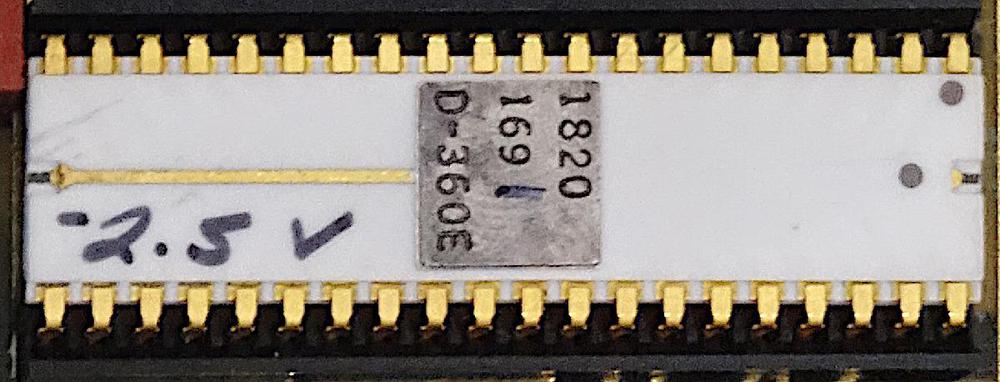 The HP Nanoprocessor, part number 1820-1691. Note the hand-written voltage "-2.5 V". The last digit (1) of the part number is also hand-written, indicating
the speed of the chip. Photo courtesy of Marc Verdiell.