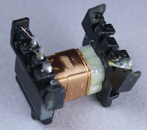 The second half of the primary winding in the flyback transformer. The 3mm boundary tape is clearly visible at the right.