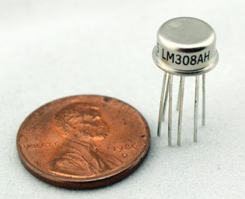 The LM308 op amp in an 8-pin metal can.