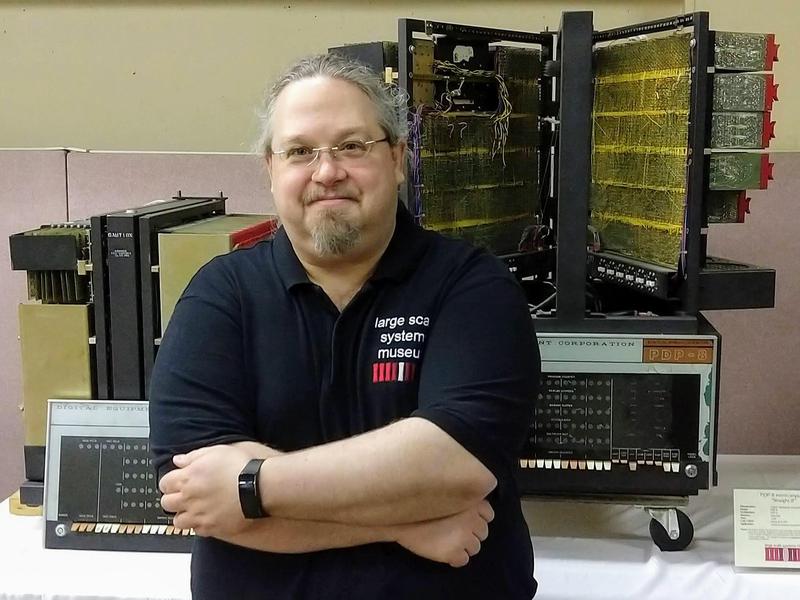 Dave McGuire, curator of the large systems, in front of PDP "Straight 8" minicomputers.
