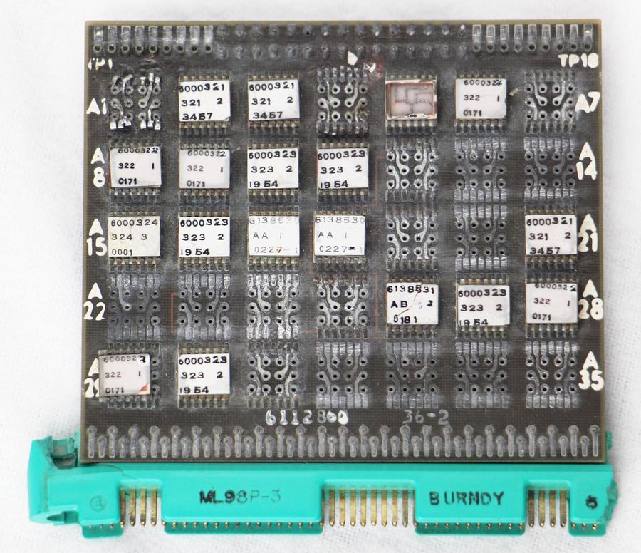 A circuit board from the Saturn V LVDA. (Click this image (or any others) for a larger version.) This board was partially disassembled when I received it and some chips are missing.