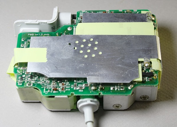 The circuit board inside the Apple 85W Macbook charger.