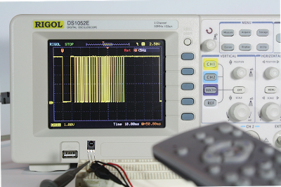 Analyzing the IR signal from a TV remote using an IR sensor and a Rigol DS1052E oscilloscope.