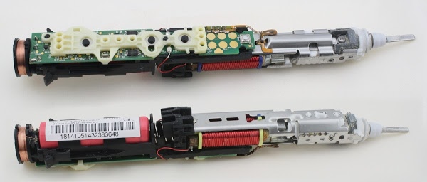 Inside the Sonicare toothbrush, top and bottom composite view. The charging coil is at the left. The battery (red) is in the lower left. The coil that vibrates the brush is in the center and the brushing mechanism is at the right.