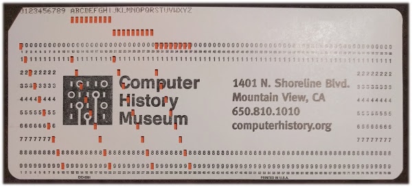 An IBM punched card, showing the encoding of digits and letters.