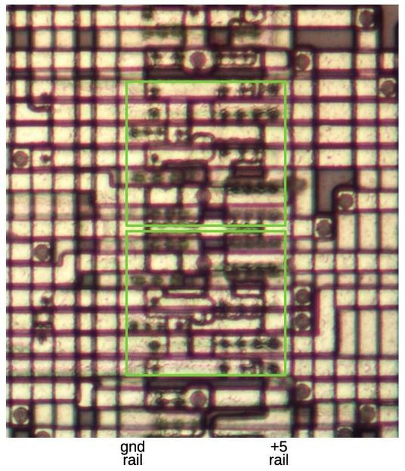 Two CMOS switches, highlighted in green. The lower switch is flipped vertically compared to the upper switch. Two CMOS switches, highlighted in green. The lower switch is flipped vertically compared to the upper switch.