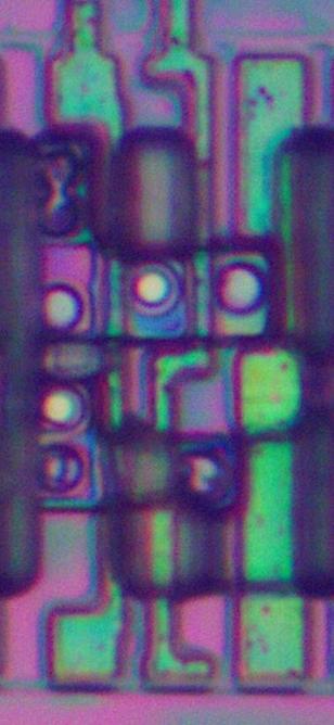 Die photo of a small NAND standard cell with the metal removed.