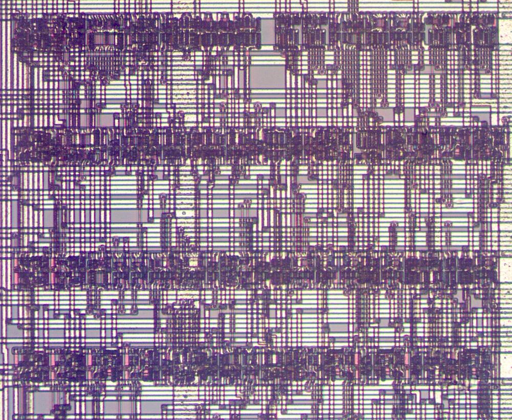 Some rows of standard-cell logic in the 386 processor. This is part of the segment descriptor control circuitry.