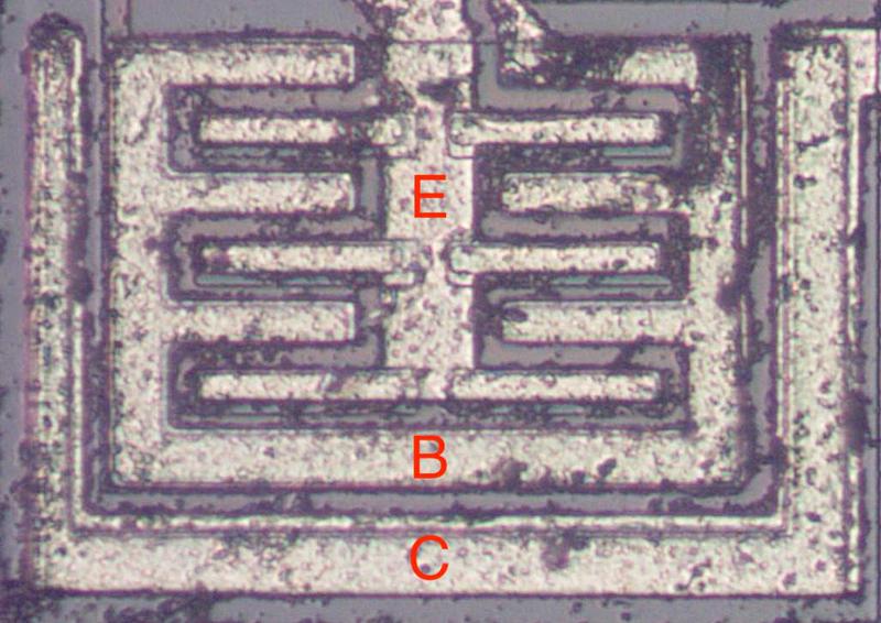 A large, high-current NPN output transistor in the 555 timer chip. The collector (C), base (B) and emitter (E) are labeled.