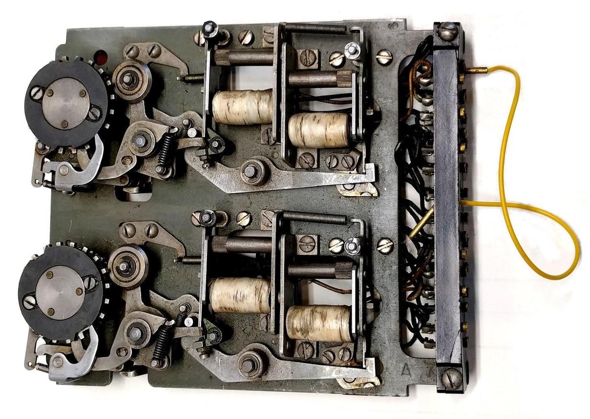 A counter unit from an IBM accounting machine (tabulator). The two wheels held two digits. The electromagnets (white) engaged and disengaged the clutch so the wheel would advance the desired number of positions.