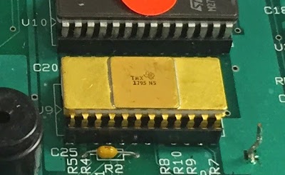 The TMX 1795 microprocessor installed in a circuit board.