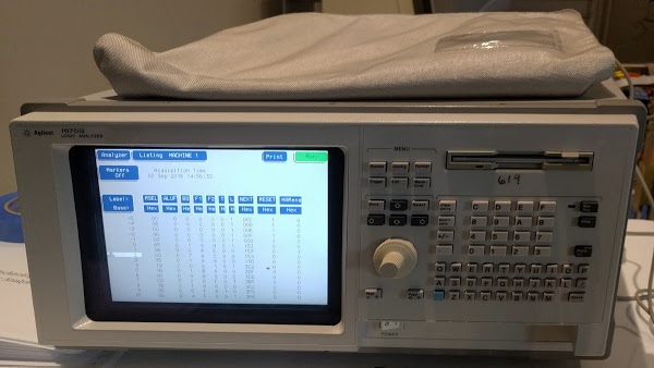 The vintage Agilent 1670G logic analyzer that we connected to the Xerox Alto. The screen shows the start of the boot sequence.