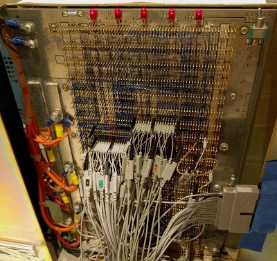 We added more probes to the Alto's backplane to monitor the processor bus. The probes are connected to a vintage Agilent logic analyzer.