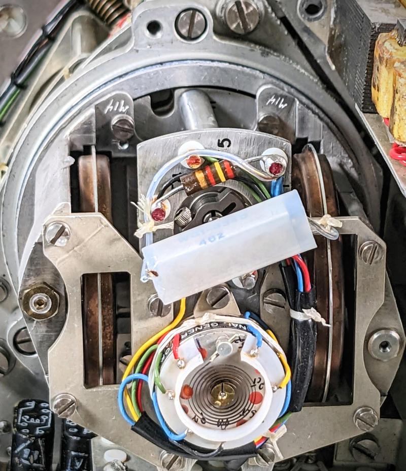 Inside the transducer housing, showing the bellows and inductive pickup.