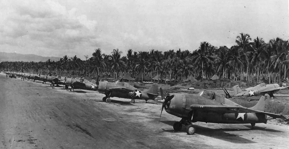 
The photo shows a long line of F4F Wildcats at Henderson Field, Guadalcanal, Solomon Islands, April 14, 1943.
Solomon Islands was home to several cargo cults, both before and after World War II (see map).
Source: US Navy photo 80-G-41099.