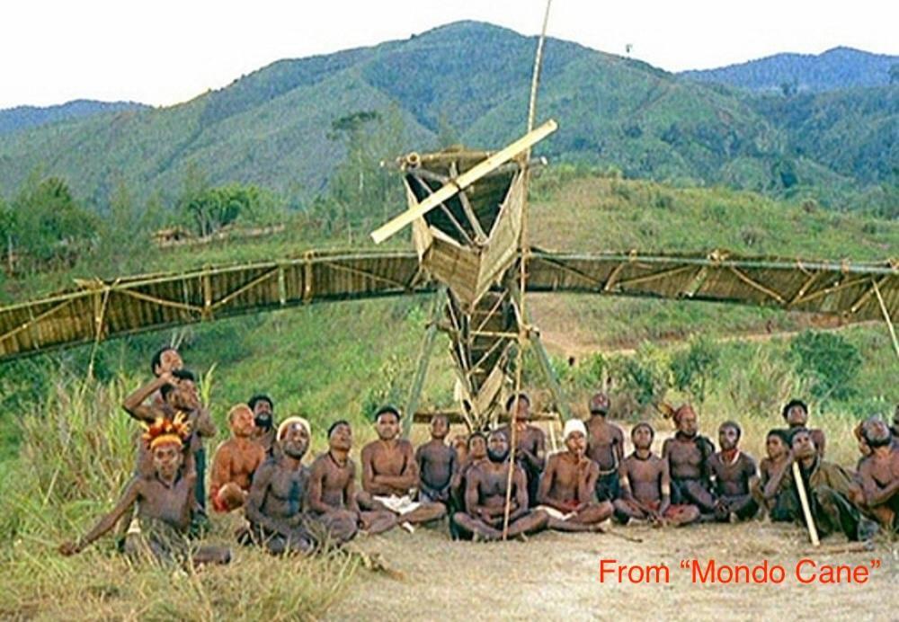 Screenshot from Mondo Cane, 
 showing the cargo cultists posed in front of their airplane.