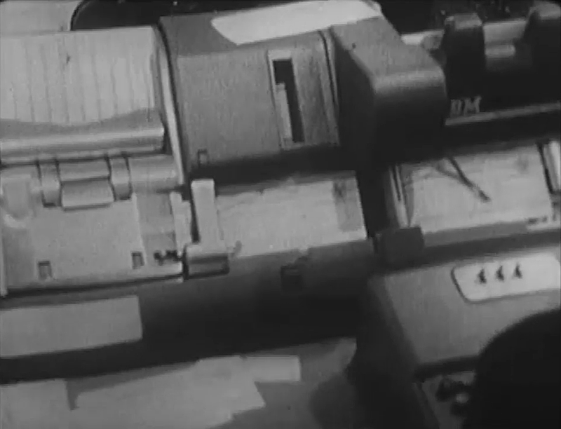Entering the customer data into the IBM 26 keypunch. Still from CBC video.