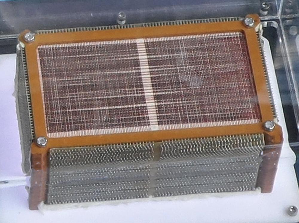 The core stack from the Saturn V LVDC (Launch Vehicle Digital Computer) consists of 14 core planes. This stack is at the US Space & Rocket Center. Photo from NCAR EOL. I retouched the photo to reduce distortion from the plastic case.