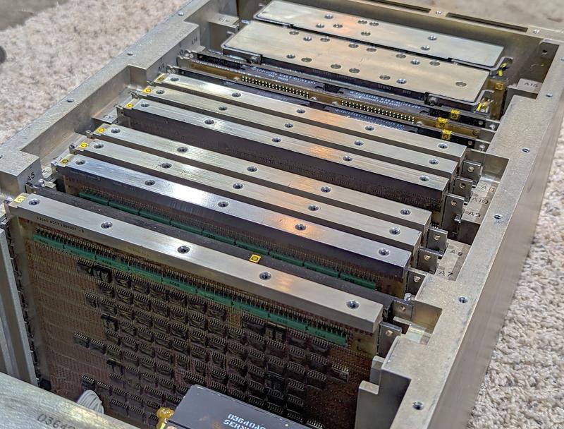 The IBM AP-101SL Spacelab computer. The circuit boards are much larger than the original Spacelab computer boards or the original AP-101B boards. Note the flat-pack ICs on the boards. Photo courtesy of Kyle Owen.