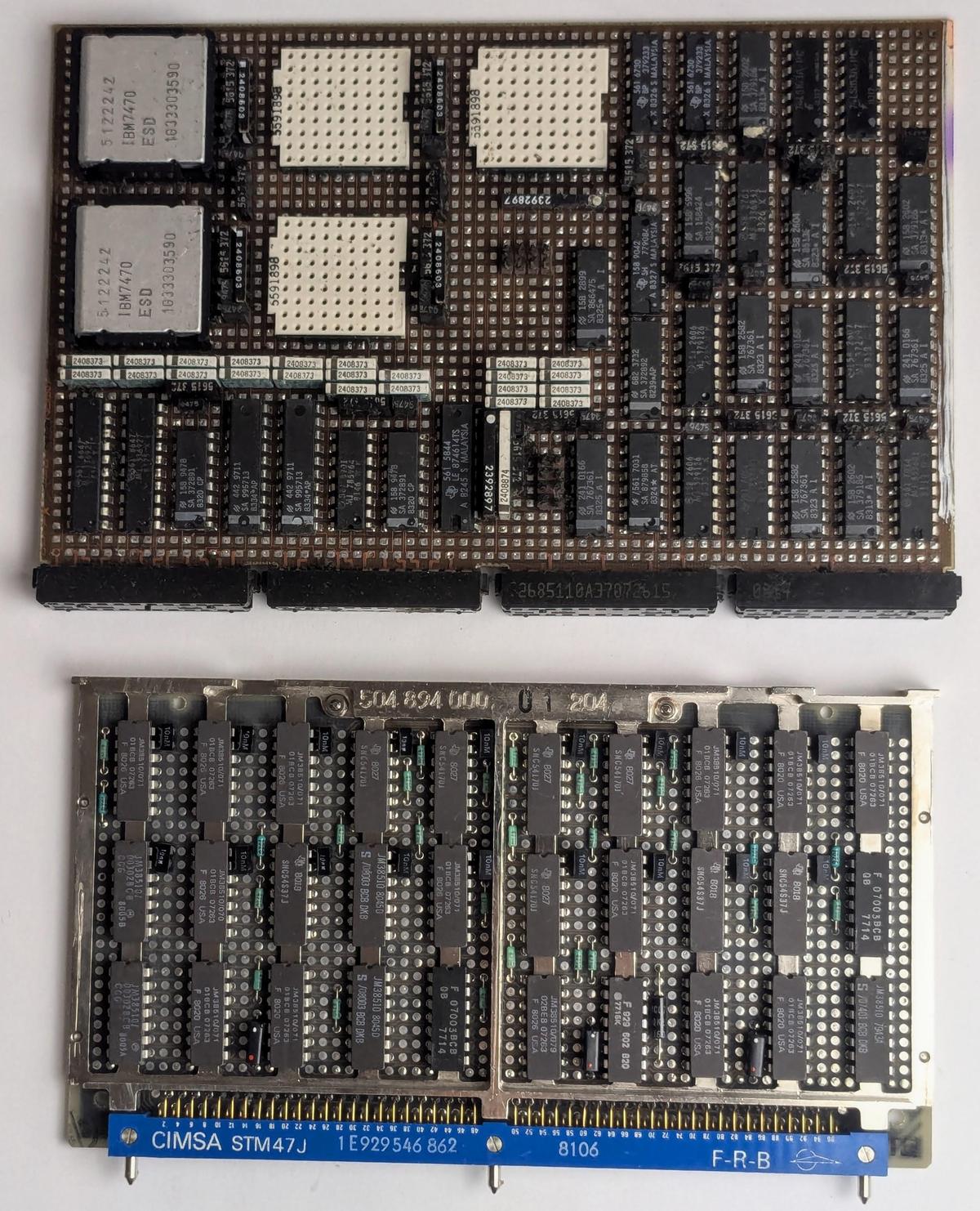 An IBM computer board (top) and a board from the Spacelab computer (bottom).