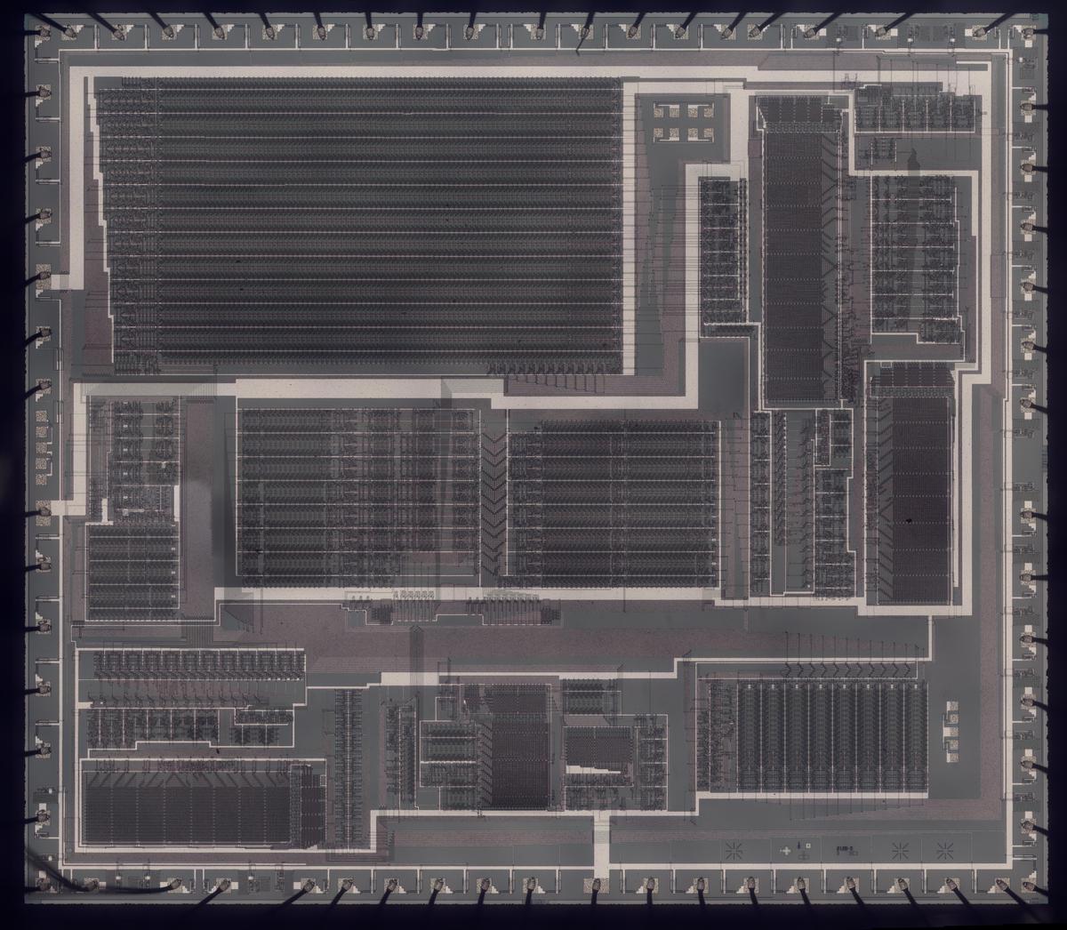 Die photo of the DX7's YM21280 Operator chip. Click this photo (or any other) for a magnified version.