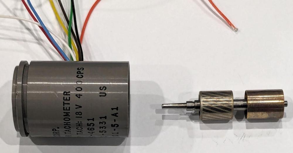 A motor/tachometer similar (but not identical) to the one in the attitude indicator).