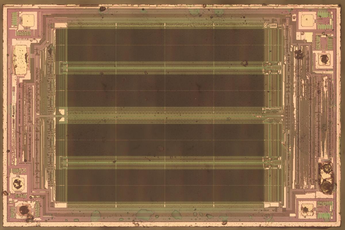 Die of the Ramtron FM24C64 FRAM chip. (Click this image (or any other) for a larger version.)