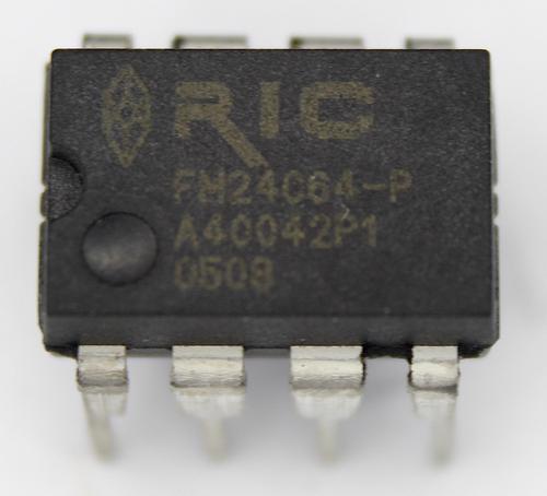 The chip is packaged in an 8-pin DIP. "RIC" stands for Ramtron International Corporation.