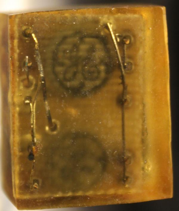 In this view of the module, the script "GE" logo is visible on top of the transistors. These transistors are part number 2N491