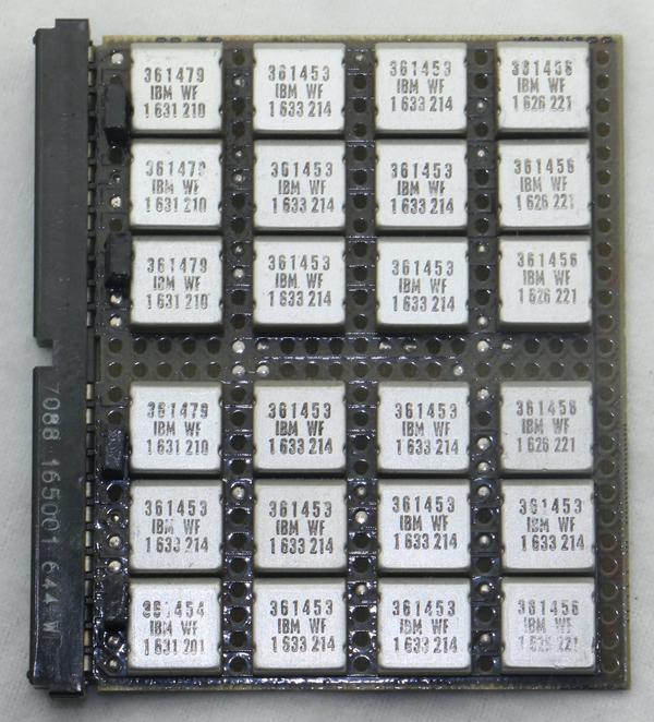 A logic board using SLT modules. Each square metal can is a module.