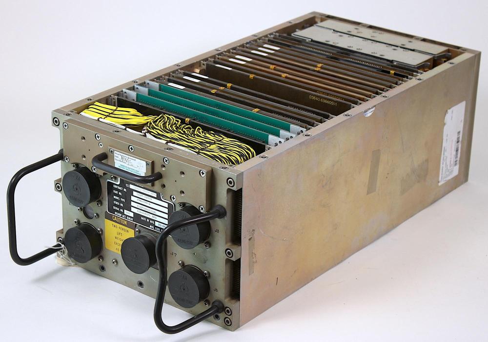 The AP-101S with its cover removed. This is a prototype; the green boards on the left are likely development boards instead of the I/O boards that are normally in these positions.