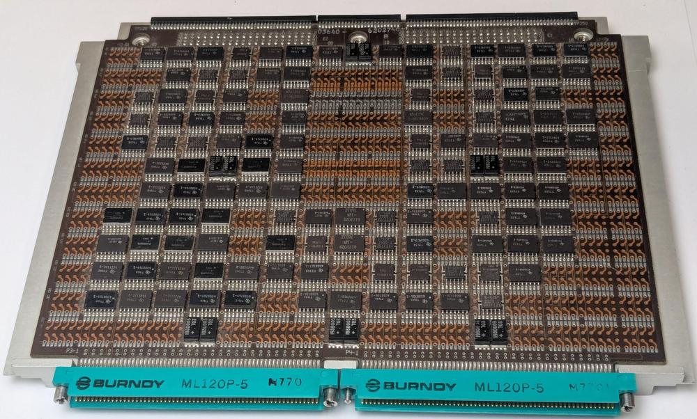 An ML-0 interface board, courtesy of Henry Brandt. This is an interface board with flip-flops, multiplexers,
and other TTL chips. The board has different edge connectors from the standard MCS boards and is a slightly different size.