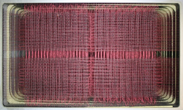 Core memory in the IBM 1401. Each plane of cores has 4000 cores in a 80x50 grid.