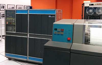 The IBM 1401 mainframe from the 1960s. The 1403 line printer is to the right, and a 792 tape drive at the back.