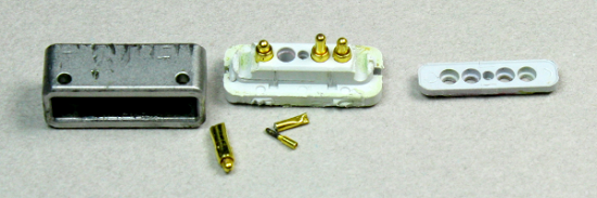The spring-loaded 'pogo pins' inside a Magsafe connector.