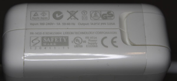 The counterfeit power supply has all the same safety indications as a real power supply.