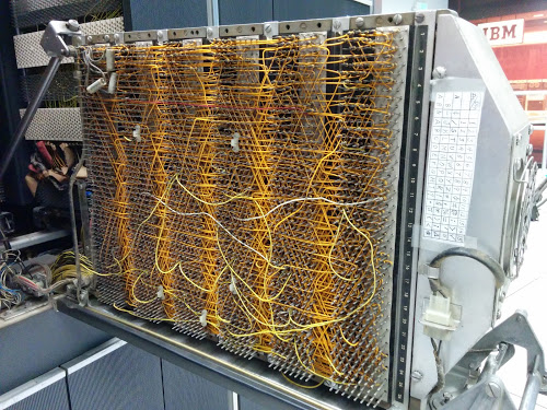 A maze of wire-wrapped wires connects the circuits of the IBM 1401 computer.