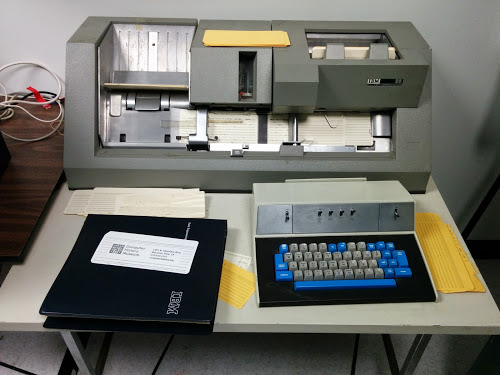 An IBM 029 keypunch preparing a card deck that generates the Mandelbrot fractal.