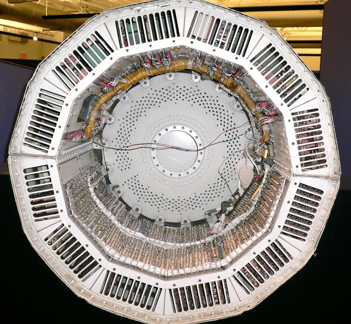 The Minuteman I guidance computer. The computer itself is the bottom half of the cylinder, with the disk drive in the 4 o'clock position. The upper half is electronics to drive the IMU and rocket. The IMU itself would be mounted in the center. Photo by Steve Jurvetson, CC BY 2.0.