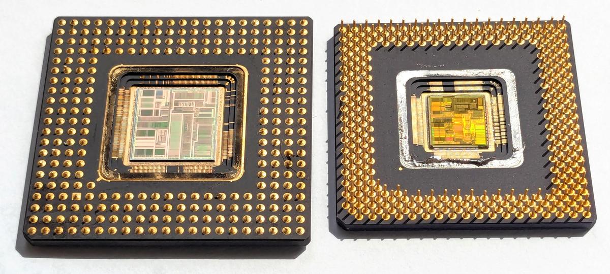 The Pentium P5 on the left and the P54C on the right, showing the difference in die and package sizes. If you look closely, the P5 die on the left lacks the "multiprocessor logic" in the weaving, showing that the weaving is the P54C. I clipped the pins on the P5 to fit it under a microscope.