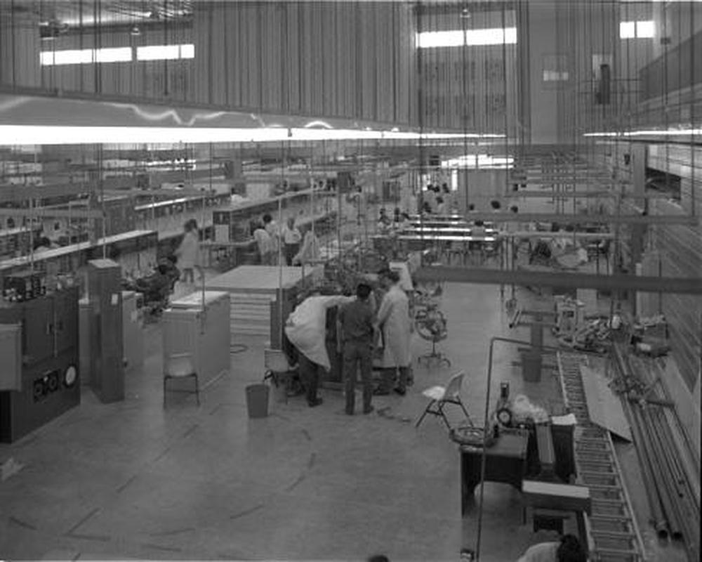 Fairchild's Shiprock plant, 1966. From the patterns on the floor, this photo may show the time period when Fairchild set up manufacturing in the school gymnasium. Photo by Jack Grimes. Photo courtesy of Computer History Museum, Henry Mahler collection of Fairchild Semiconductor photographs.