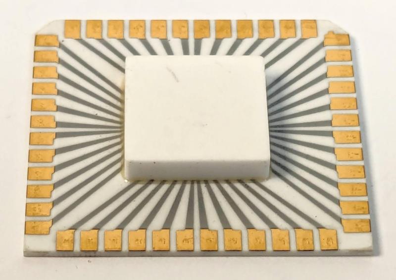 Package of the PHI chip, showing the underside. The package is flipped over when mounted in a socket.