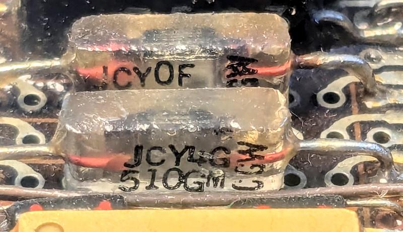 Two glass capacitors on the MIA page.